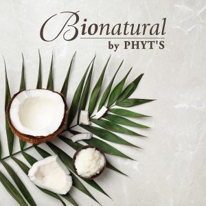 Flat lay composition with coconut oil on grey background