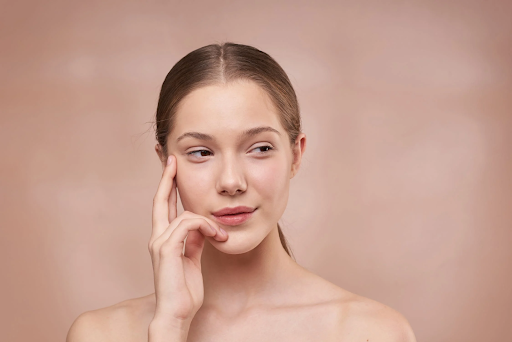 A woman showing the importance of taking care of your skin.