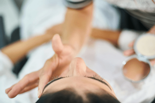 A woman following a routine to avoid having dehydrated skin